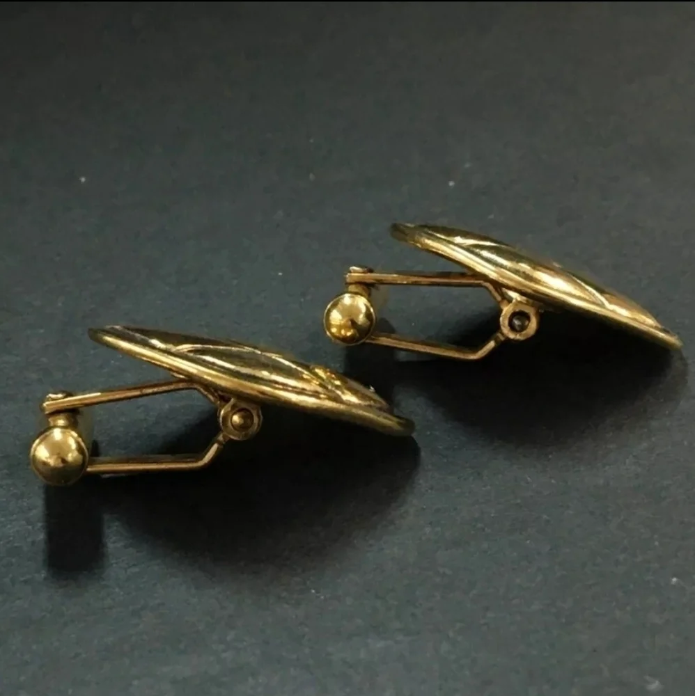 Chanel Gold Tone Cuff Links